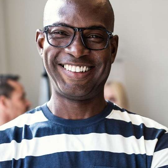 african-designer-smiling-confidently-after-an-offi-PSLKCZU-small.jpg